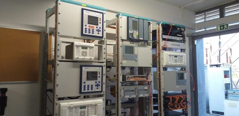 Industrial Automation lab equipment mounted on shelves.